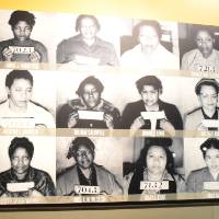 Photo of mugshots taken during civil rights movement displayed at museum